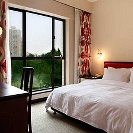 Le Garden Hotel Сиан Екстериор снимка